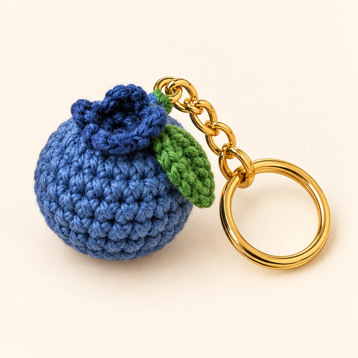 Crochet blueberry keychain